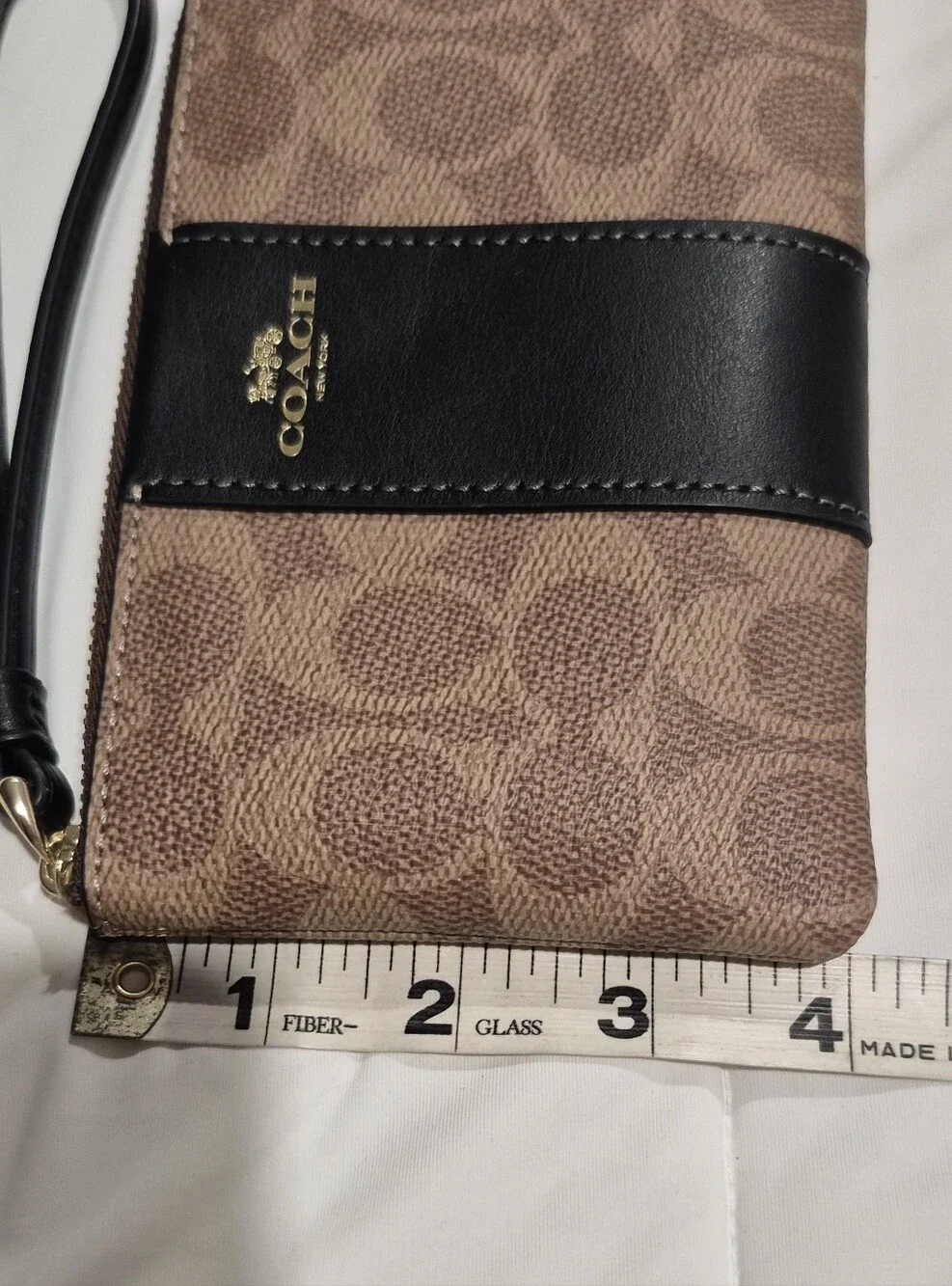 COACH Signature Canvas Wristlet in Brown & Black